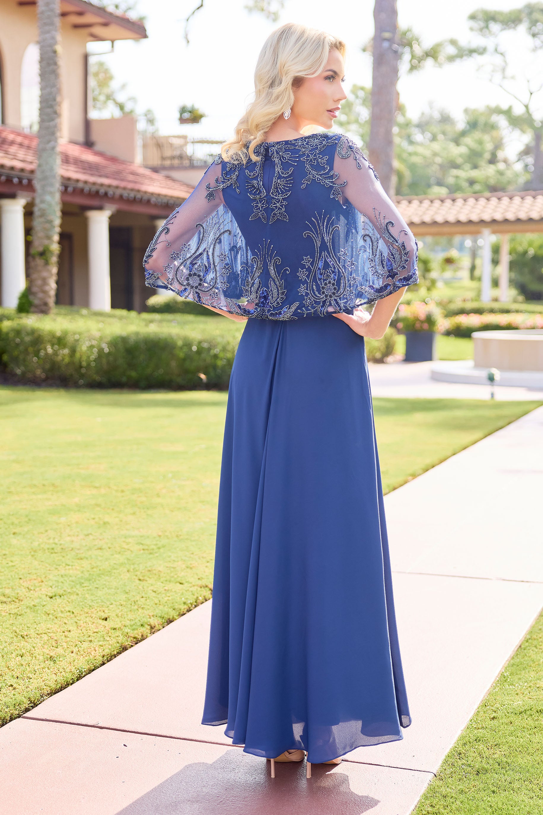 Primavera Couture -13162 A line gown with v neck and beaded work.