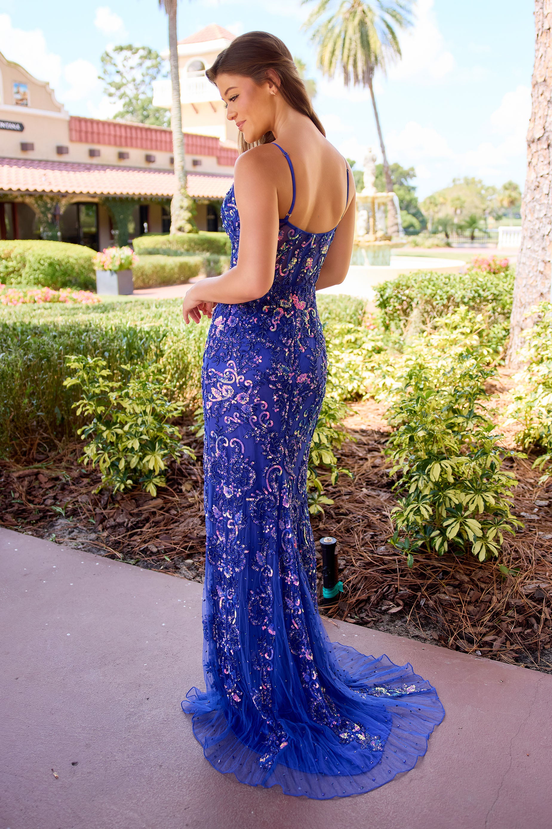 Primavera Couture -4549 V-neckline beaded gown with sheer corset bodice and side leg slit.