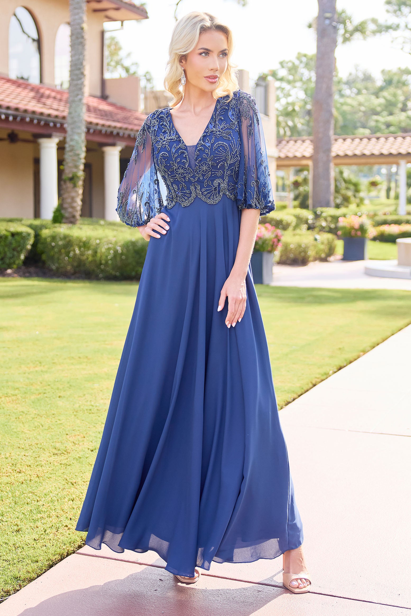 Primavera Couture -13162 A line gown with v neck and beaded work.