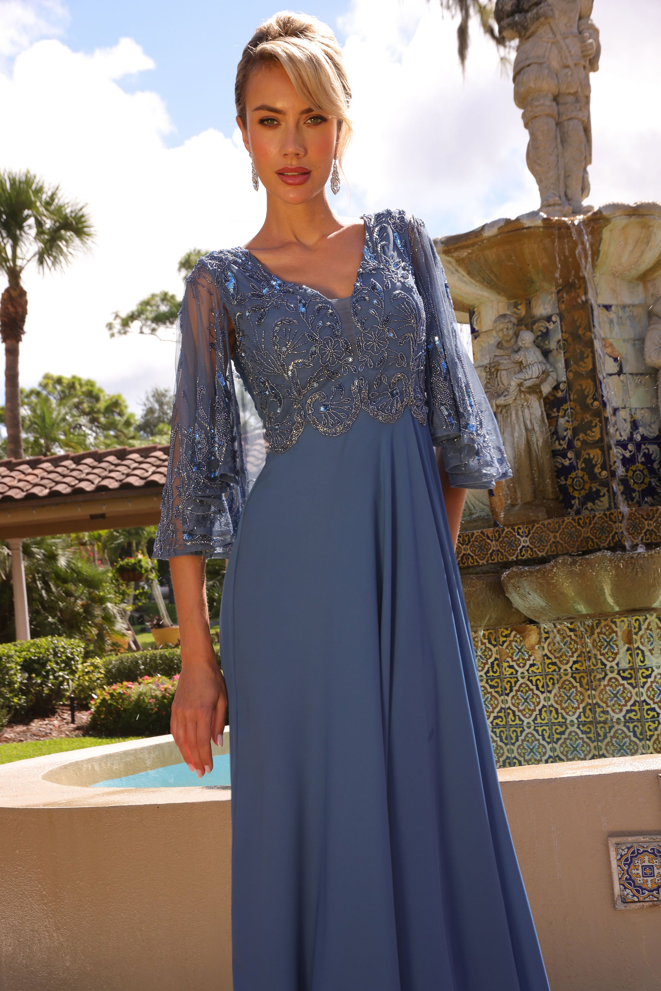Primavera Couture -13162 A line gown with v neck and beaded work.